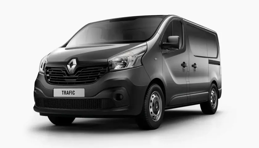 Szary van Renault Trafic 3 z napisem "TRAFIC" na grillu, gotowy do pracy.