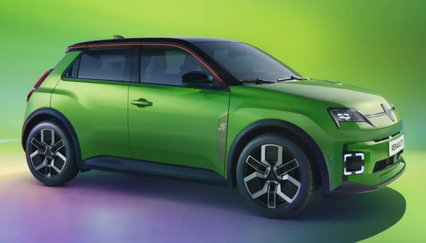 Nowoczesny, zielony Renault 5 Electric z czarnym dachem i czerwonymi akcentami.